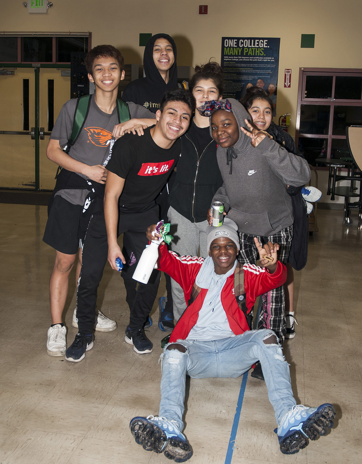 A grou p of high school students pose in front of the camera with smiles