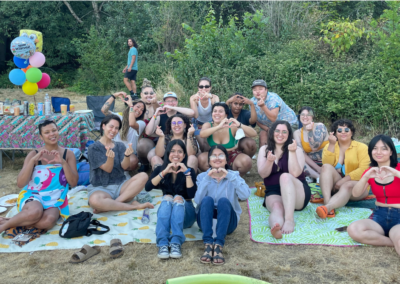 image is of FEEST youth leaders, staff and board at a park